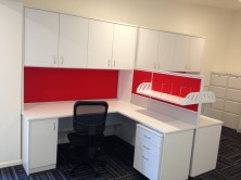Custom Desk Setting With Cupboards And Pinboard